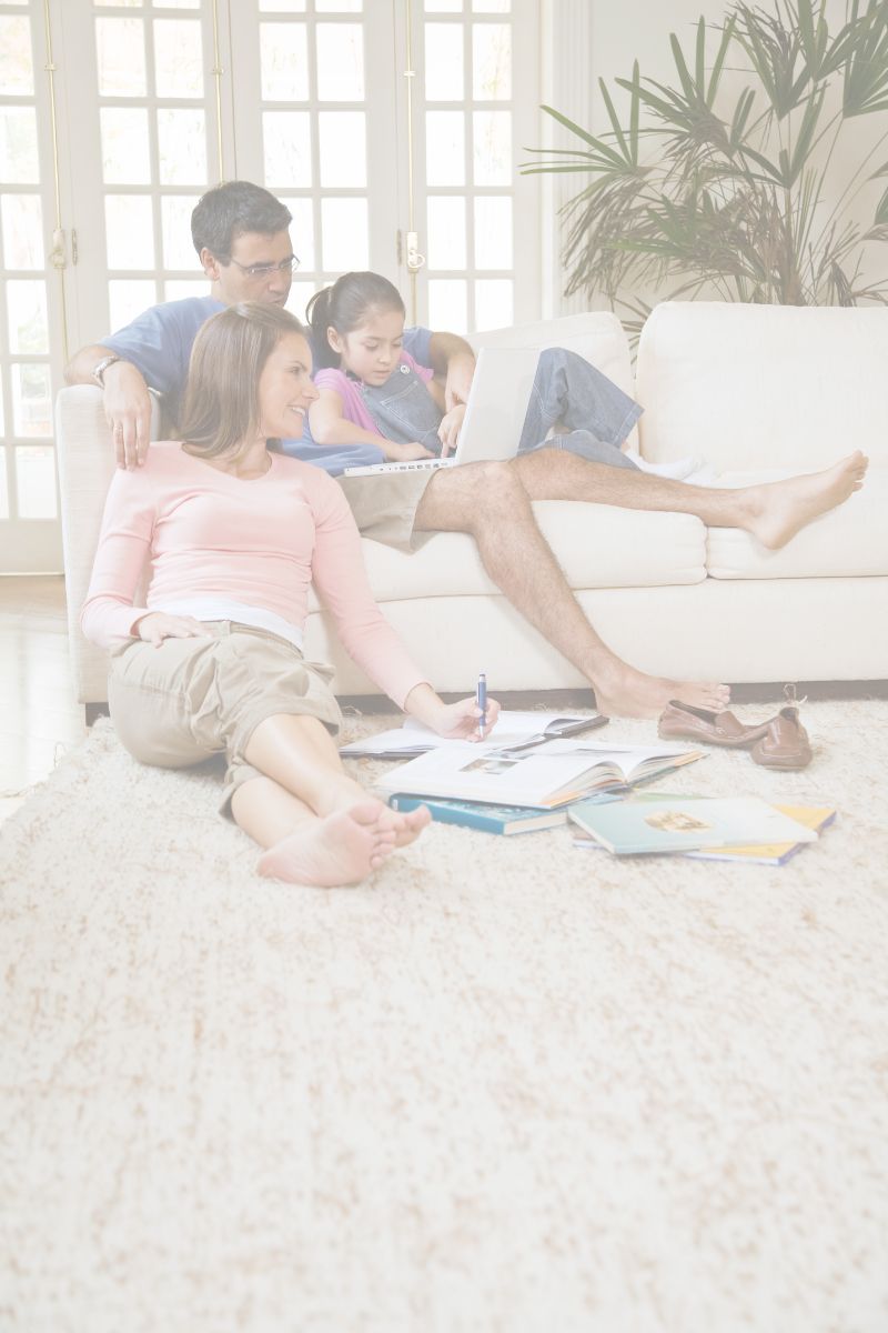 couple-with-their-kid-looking-at-computer